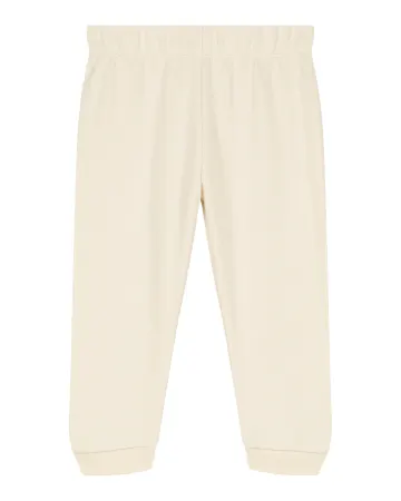Le pantalon bébé en beige naturel, avec une licorne d'Alma